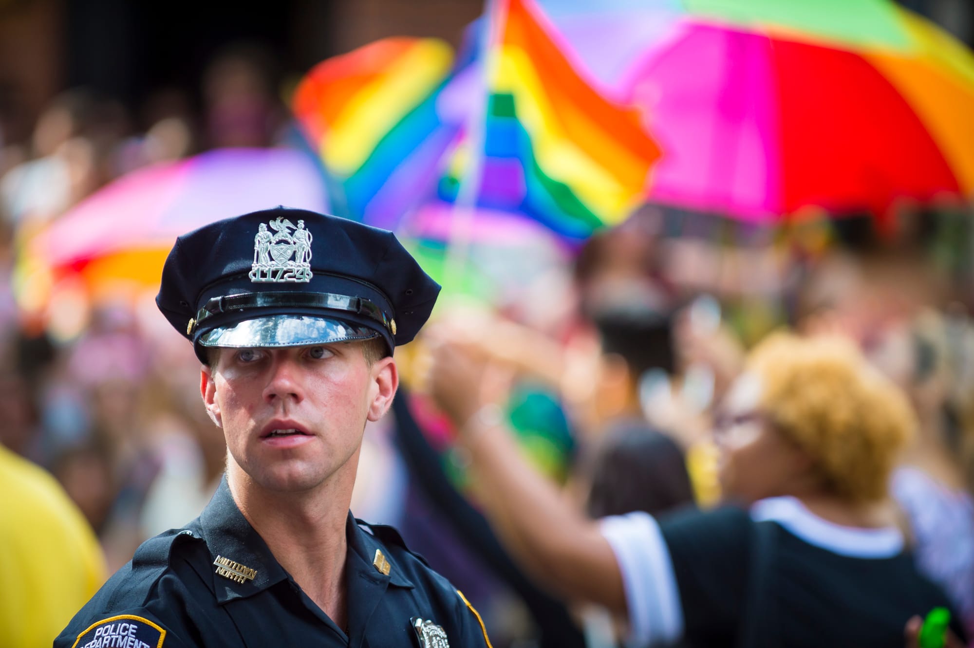 NYPD Police officer provides security on the sidelines of the annual Pride Parade.